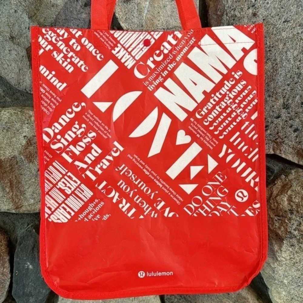 Lululemon Athletica red large reusable plastic‎ coated shopping bag